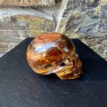 Load image into Gallery viewer, Hand Carved Skull Made of Tiger Eye
